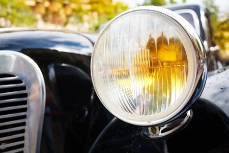 Close up of old head lights on rarity carの写真素材