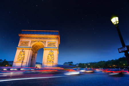 Paris, France - October 6 2015: Arc de thump and night trafficのeditorial素材
