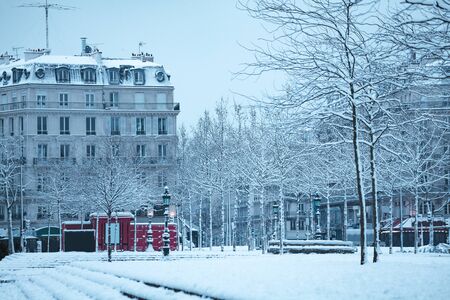Republic square and street in Paris under snow