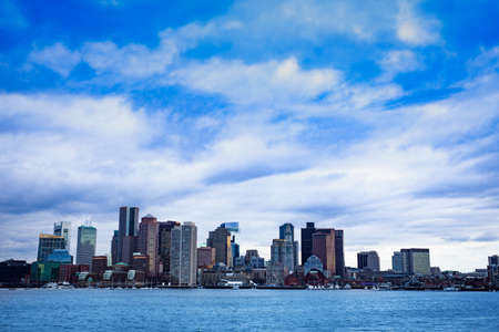 Boston city downtown view from East side of the inner harbor Massachusetts, USAの写真素材