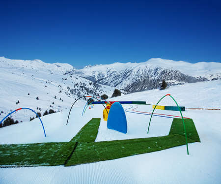 Slope and equipment for small children in infant ski school the mountain in skiing centerの写真素材