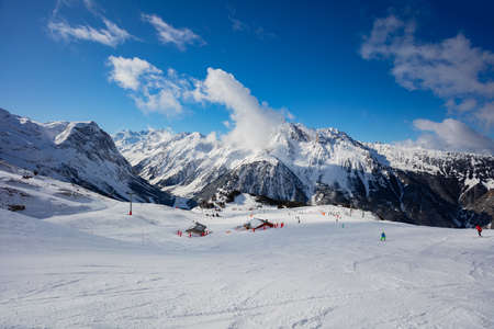 Panorama of mountains and ski pistes in Pralongan valley in Franceの写真素材