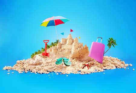 Vacation concept sand beach island and sandcastleの写真素材