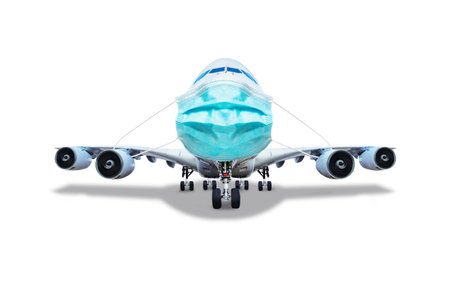Pandemic concept - plane with surgical mask on itの写真素材