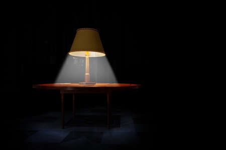 Old style lamp on the table and light rays from itの写真素材