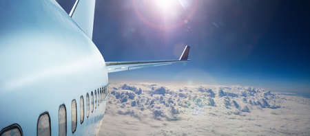 View on the airplane tail from wing in sky conceptの写真素材