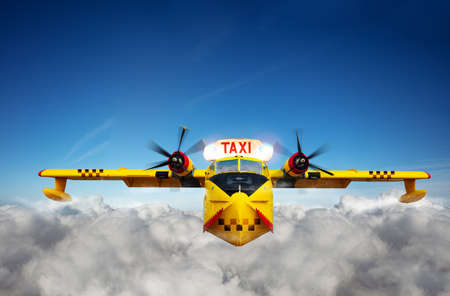 Yellow air taxi airplane transportation in skyの写真素材