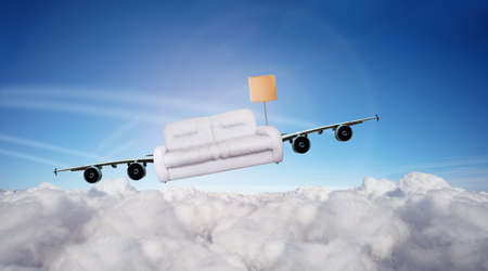 Concept of sofa fly with airplane jet wings in skyの写真素材