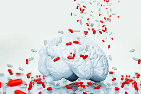 Brain illness and medication concept with pillsの写真素材