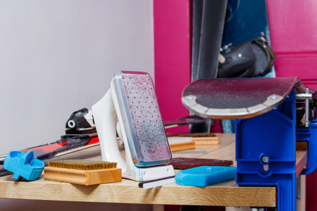 Set for ski equipment maintenance on workbench with skis vicesの写真素材