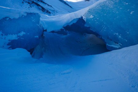 Pristine ice glacier formations create a natural frosty caveの写真素材