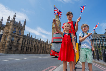 Young travelers near Big Ben happy to visit center of Londonの写真素材