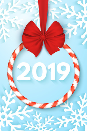 Happy New Year 2019 banner. Christmas sweet spiral lollipop with red ribbon and bow. Cut out of paper snowflakes on a blue background. Vector illustration.のイラスト素材