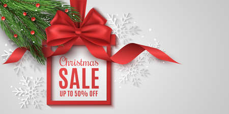Gift box label for Christmas sale. Realistic red bow with curly ribbon and fir tree. Ad tag. Template to advertise your business promotions. Commercial discount event. Background of paper snowflakes. Vectorのイラスト素材