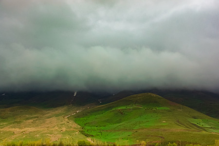 Landscape of mountain, cloudy and dramatic sky. Beauty in nature from Turkey. Clouds top on of...