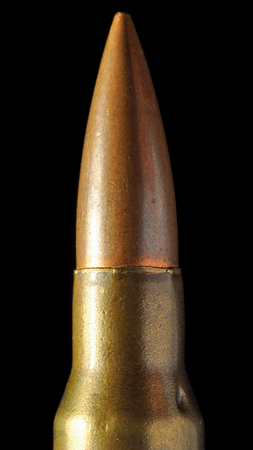The view of macro bullet on black background.