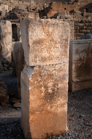 Ancient Greek inscription on stone block, Ephesus, Turkey.の写真素材