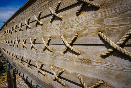 Ancient wooden shipwreck reconstruction detail on land, Urla, Izmir, Turkey. Ancient Greek culture, Kyklades ship.の写真素材