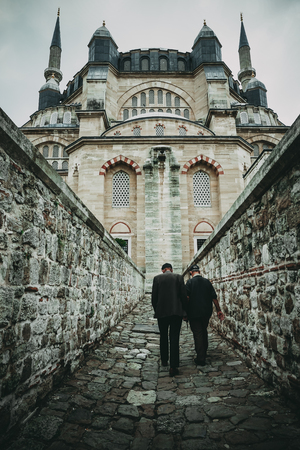 Old Men enters the Selimiye Mosque (Camii), designed by Mimar Sinan in 1575. Edirne, Turkey.の写真素材