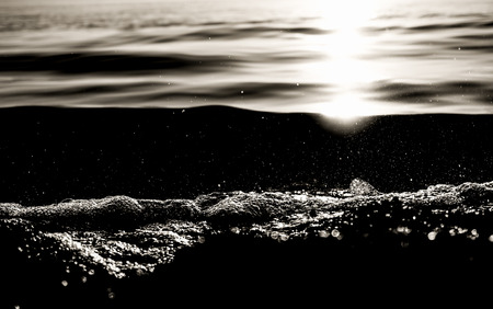 Water splash in lake wave. Black and white artwork. Iznik, Bursa, Turkey.の写真素材
