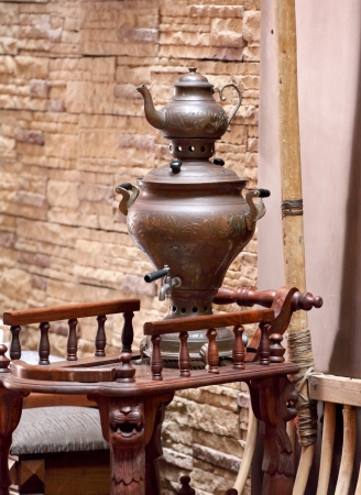 A very old samovar on the tableの写真素材
