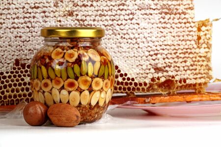 natural honey in a glass jar