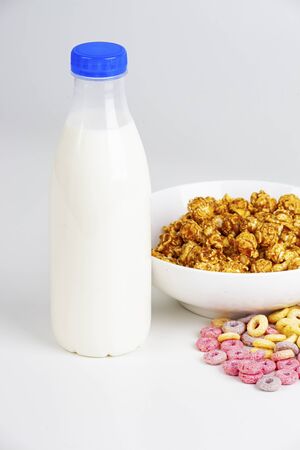 bottle of milk and popcornの写真素材
