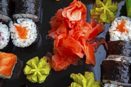japanese sushi on a black plateの写真素材