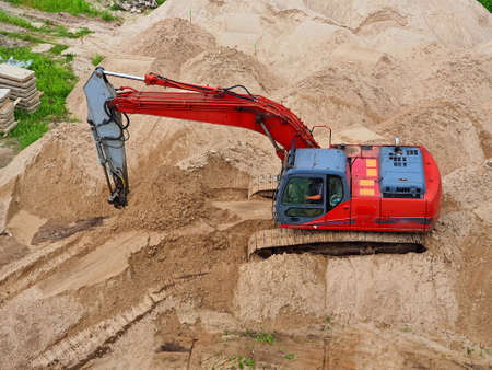 excavator and shovel in the construction siteの写真素材