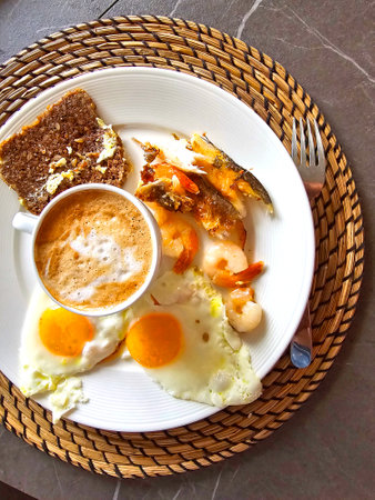 tasty fried eggs with baconの写真素材