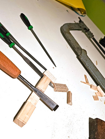 Carpenter tools on the workbench, closeup of photo