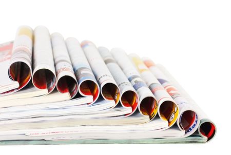 stack of magazines isolated on white backgroundの写真素材