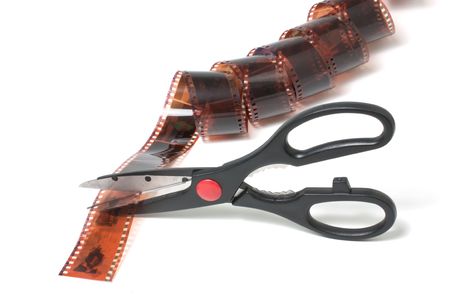 Scissors cut film isolated on white backgroundの写真素材