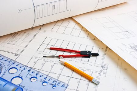architectural drawing with a ruler and compass
