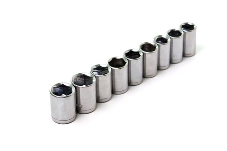 Metal wrench sockets close up isolated  on a white background