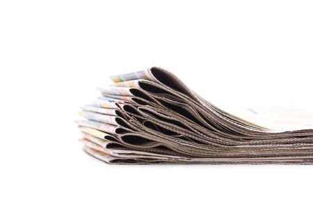stack of newspapers isolated on a white background
