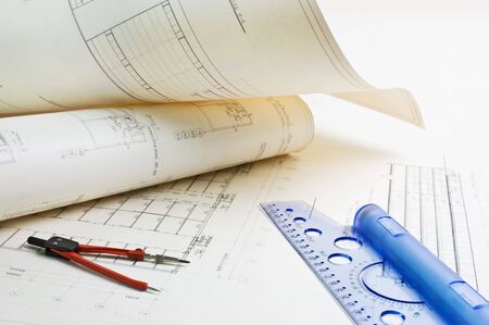 Old architectural drawing with a ruler and compassの写真素材