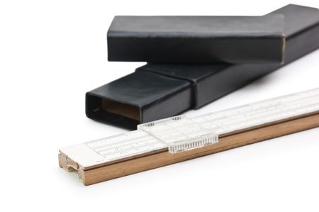Slide rule and box isolated on white backgroundの写真素材