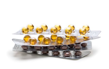 stack of packages of tablets isolatedの写真素材