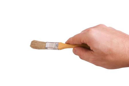 hand holds the brush to drawの写真素材