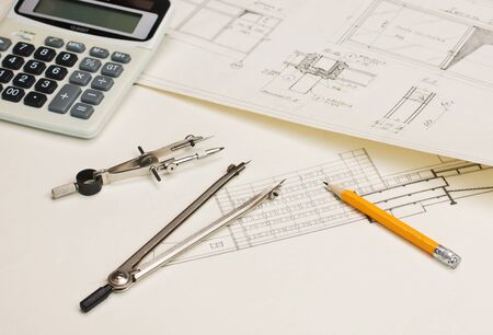 technical drawings and a calculatorの写真素材