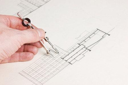 technical drawings and hand with a pencilの写真素材