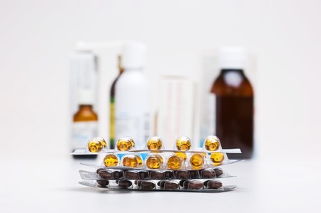 stack of packages of tablets and a group of drugsの写真素材