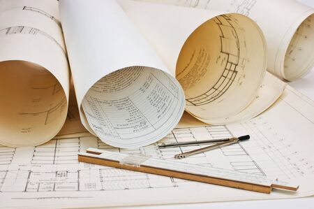 Old architectural drawing with a ruler and compassの写真素材