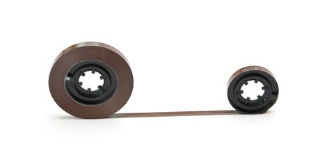 twisted magnetic tape isolated on white backgroundの写真素材