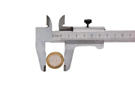 European coin and trammel isolated on a white backgroundの写真素材
