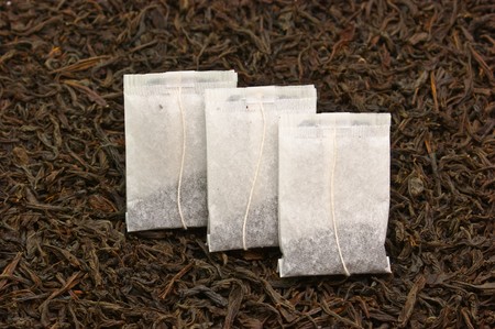 three paper bags with teaの写真素材