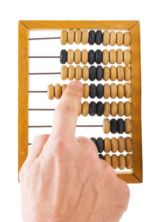 hand and a wooden Abacus isolatedの写真素材
