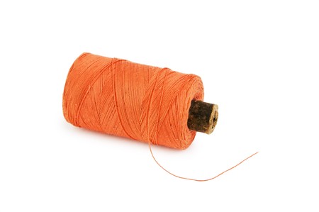 spool of thread isolated on a white backgroundの写真素材