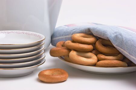 tea set and bagels on a plateの写真素材